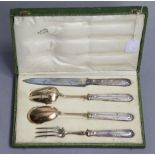 A set of late 19th/early 20th century French servers comprising a pair of meat carvers & pair of