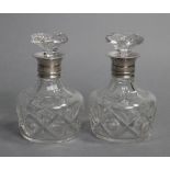 A pair of Stuart Crystal heavy cut glass decanters with mushroom stoppers & sterling silver-