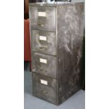 An art-metal four-drawer filing cabinet (sandblasted), 18” wide x 51¾” high.