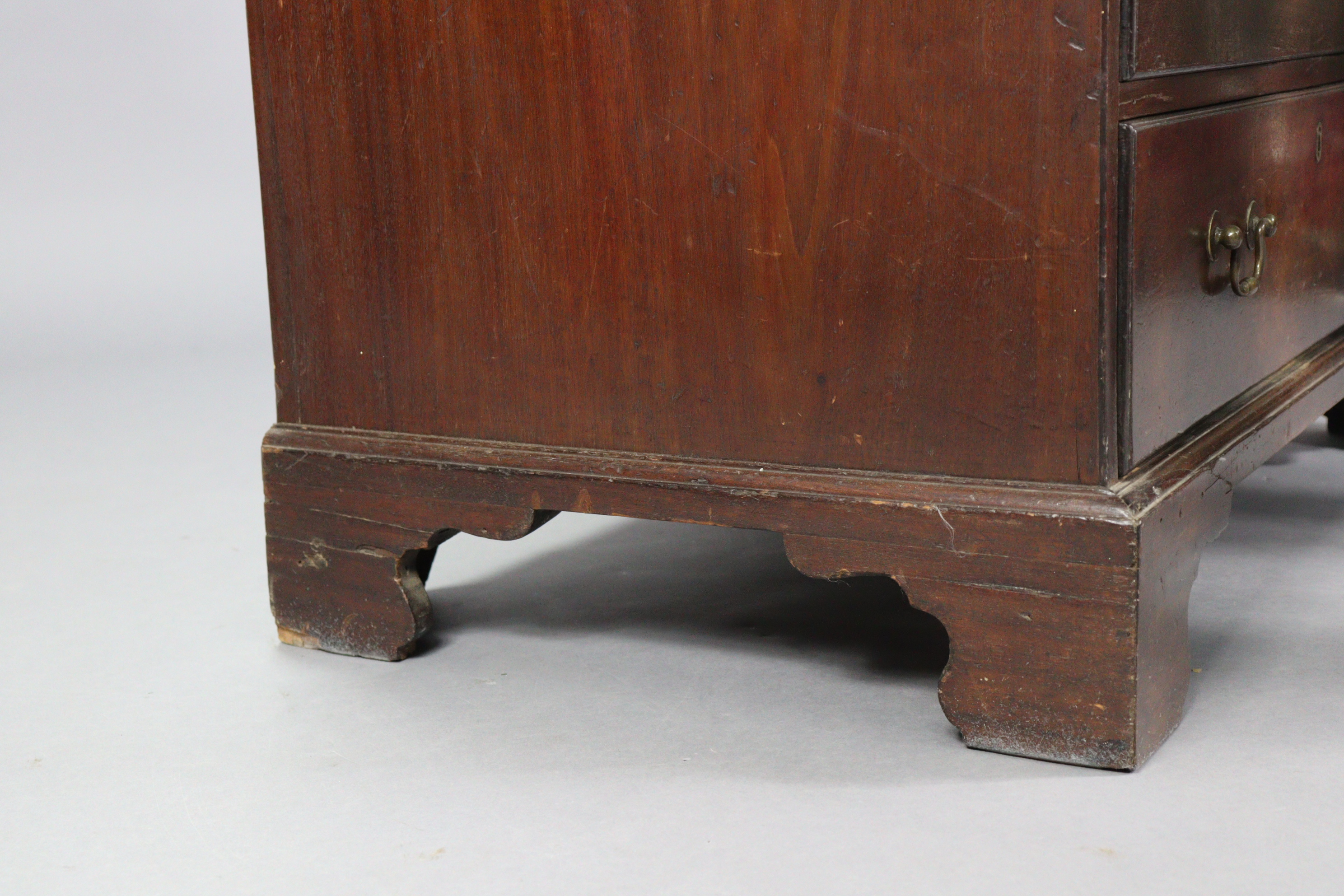 A Georgian mahogany bureau with a fitted interior enclosed by a fall-front above four long graduated - Image 8 of 8