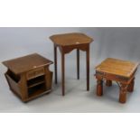 An Edwardian oak occasional table with canted corners to the square top, & on square tapered legs,