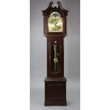 A reproduction longcase clock with a brass dial, & in an oak-finish case, 79” high.