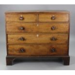 A 19th century mahogany chest fitted two short & three long graduated drawers with turned knob