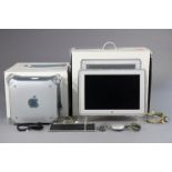 An Apple “Power Mac G4” computer, boxed.