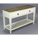 A white & natural-finish wooden side table fitted two frieze drawers, & on square tapered legs