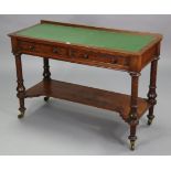 A mahogany side table inset green leatherette, fitted two frieze drawers, & on turned legs & steel