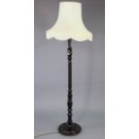 A beech standard lamp with a turned & barley-twist centre column, with shade; & various decorative p