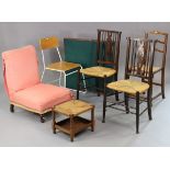 A pair of wheel-back occasional chairs with woven-rush seats, & on round tapered legs; together with