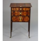 An early 19th century side table with grained effect simulating parquetry to the top & front, fitted