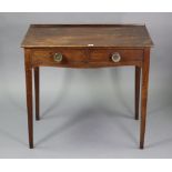 A 19th century oak side table fitted two frieze drawers & on four square tapered legs, 32” wide x