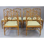 A set of six vintage faux-bamboo dining chairs (including a pair of carvers) each inset with a woven