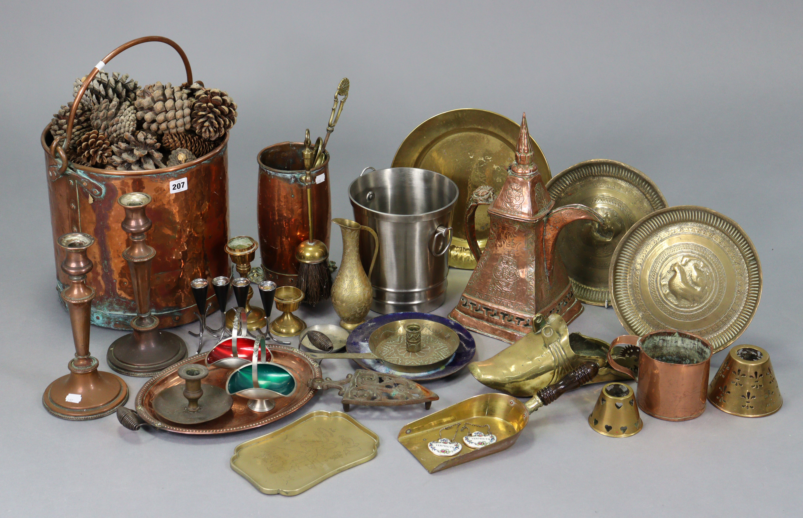 A copper cylindrical coal bucket, 11¾” high; a pair of copper candlesticks, 11” high; & various
