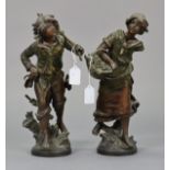 A pair of painted spelter male & female harvester figures, 14¾~ high (w.a.f.).