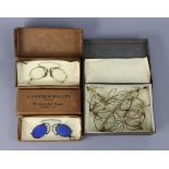 A pair of vintage pince-nez with blue tinted glass lenses; together with nine various other pairs of