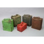 Five various vintage petrol cans.