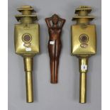 A pair of reproduction brass car lamps “Limehouse Lamp Co.”, 18” high; & a pair of novelty carved