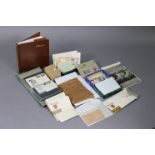 A collection of world stamps in four albums/folders & loose, sorted into envelopes, etc; various