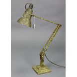 A vintage Herbert Terry of Redditch anglepoise desk lamp with marbled green finish.