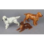 A Beswick model of a standing Spaniel, 5¾” high; another of a Red Setter (No. 1060); & a Royal