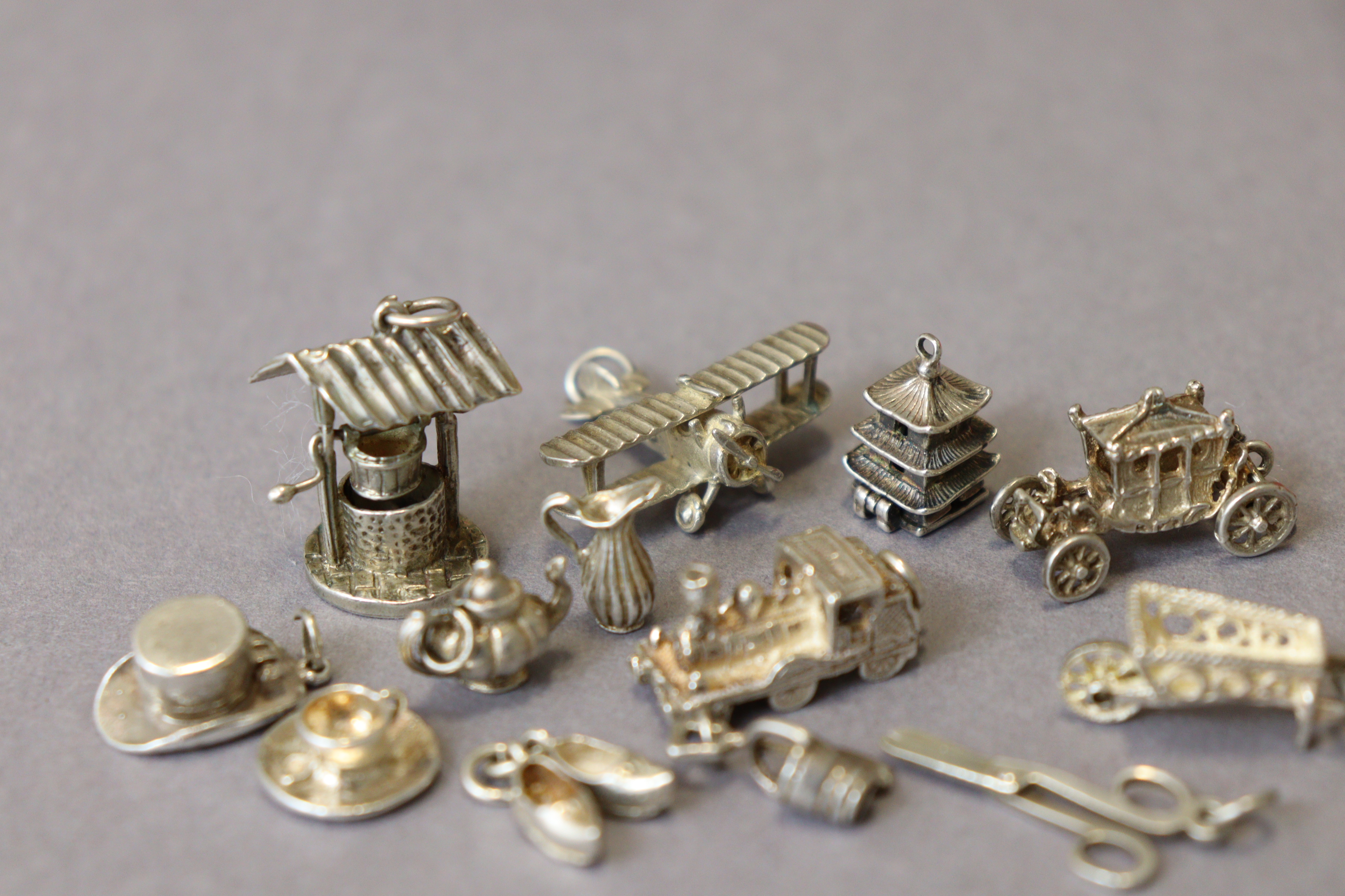 Thirteen various white metal pendant charms (loose), three of which marked “silver”. - Image 2 of 3
