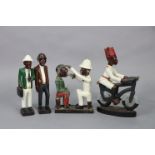 Four African painted & carved wooden caricature figures.