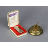 A Win cigarette lighter (cased); & an M & G Pensions brass “Sundial” paperweight, 2” high.