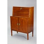 A mid-20th century mahogany cocktail cabinet enclosed by a hinged lift-lid & fall-front above a