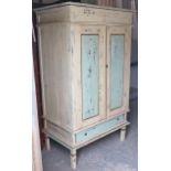 A continental-style white & pale blue painted wooden tall cabinet enclosed by a pair of panel