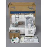 A Brother “AE 1700” electric sewing machine, boxed.