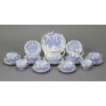 A Royal Worcester porcelain “Blue Dragon” transfer-printed part tea service comprising: a teapot,