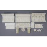 A collection of reproduction plaster casts of architectural friezes.