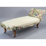 A late 19th century daybed with a scroll-end (requires upholstery), on four turned legs with ceramic