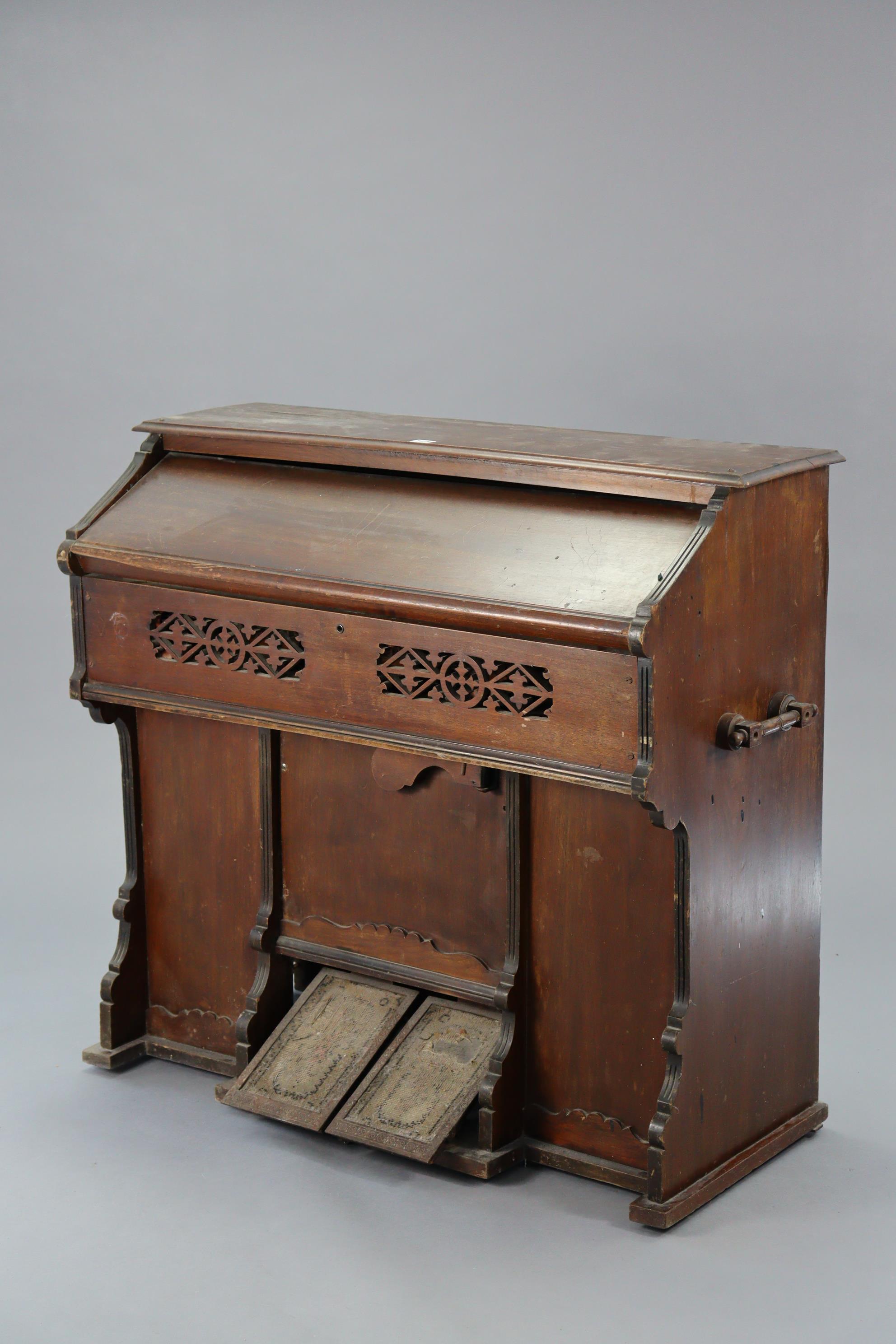 A vintage harmonium by Metzler & Co. of London in a walnut case, 41” wide x 37½” high. - Image 3 of 4