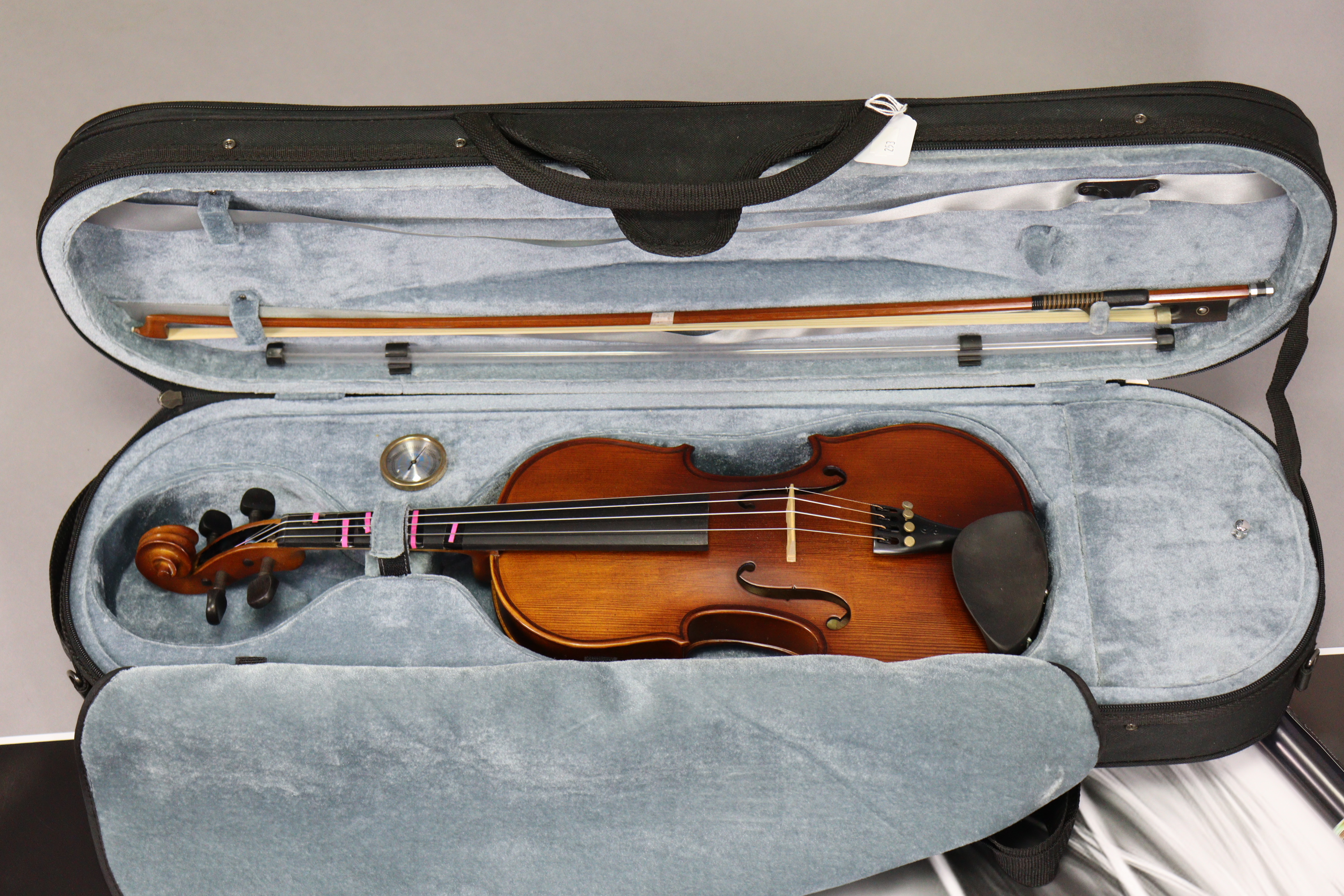A Stentor violin & bow, cased; together with three modern posters. - Image 2 of 8