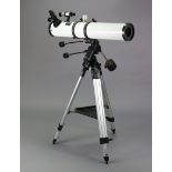An Orion 114mmx 910mm astronomical telescope (Model No. 280), with tripod, boxed.
