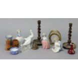 Three Lladro Nao ornaments; a pair of oak candlesticks, 10” high; & sundry other items.