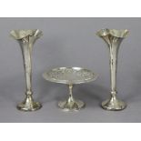 A pair of silver trumpet-shaped posy vases with lobed rims, each inscribed “G.C.M, Bridge Drive,