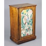 A Victorian inlaid walnut sheet music cabinet fitted two shelves enclosed by a glazed door, on