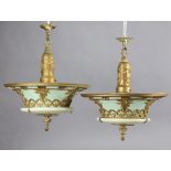 A pair of 20th century opalescent glass & gilt-metal circular ceiling light fittings of pale blue