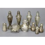 Two pairs of sterling vase-shaped pepper pots, 4¾” high; & six other small condiments (12½oz total)