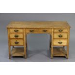 A late 19th/early 20th century ash aesthetic-style desk with moulded edge to the plain rectangular