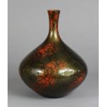 A contemporary Chinese glass vase of squat round form, with flared neck & of crackled red, gold &