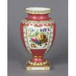 A Royal Crown Derby porcelain ovoid vase of pink ground with gilt decoration, & finely painted