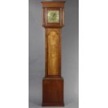 A late 18th century longcase clock in mahogany case, the brass dial with engraved