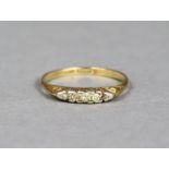 An 18ct gold ring set five small rose diamonds, size Q/R, 2.2g.