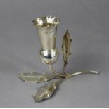 An Edwardian silver posy vase in the form of a thistle, the leaves & stem forming the support, 5”
