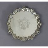 A George III silver waiter with raised pie-crust & shell border, an engraved armorial to the