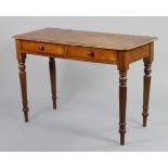 A Victorian mahogany side table with moulded edge to the rectangular top, fitted two frieze