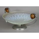 A frosted and opalescent circular glass dish with pair of stylised silvered metal & turned wood