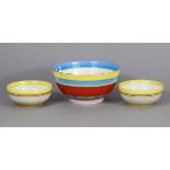 A Clarice Cliff 7½” deep bowl with brightly-coloured banded decoration to the exterior; & a pair